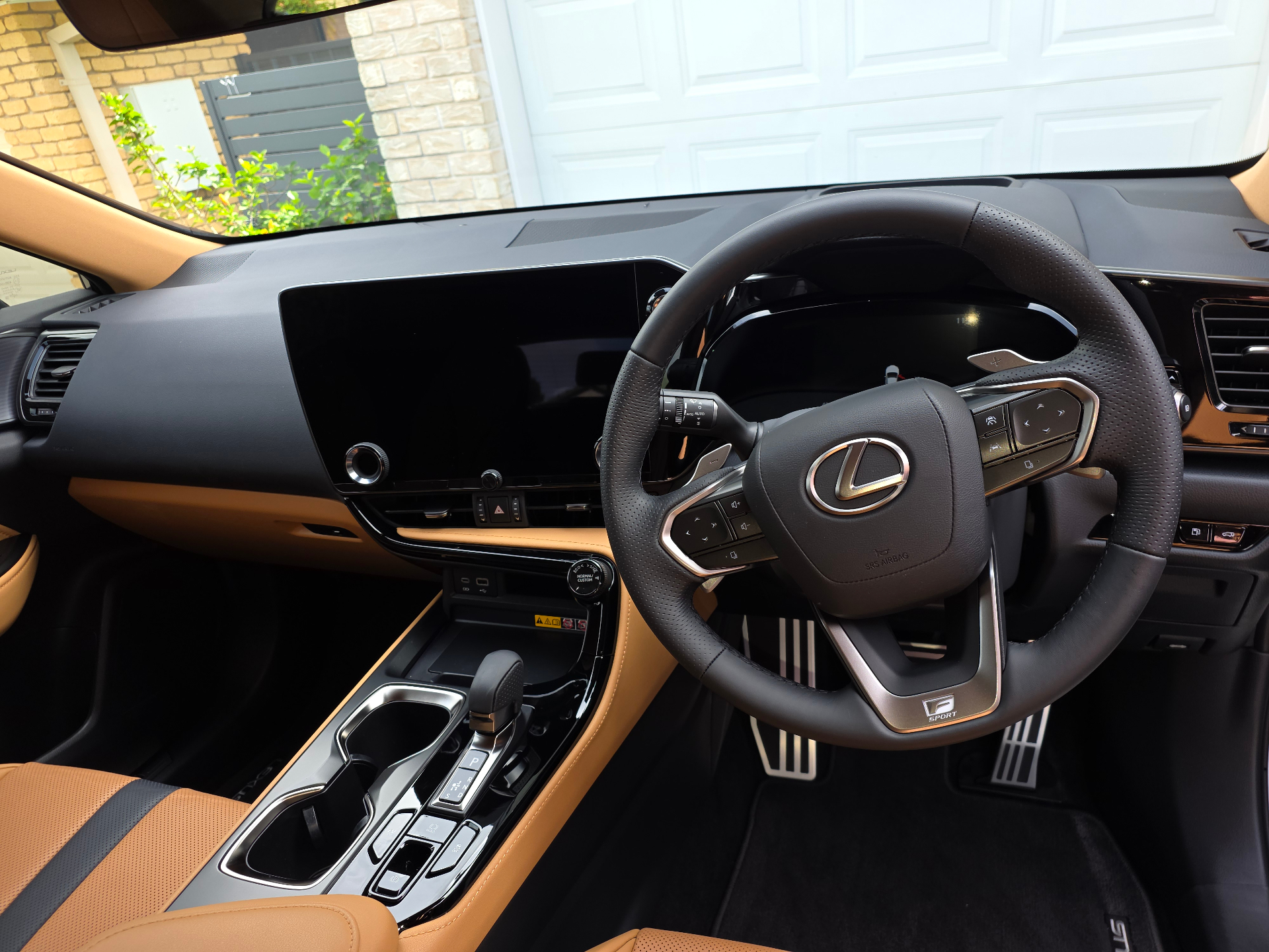 Lexus tan leather interior — Pitts Automotive Studio